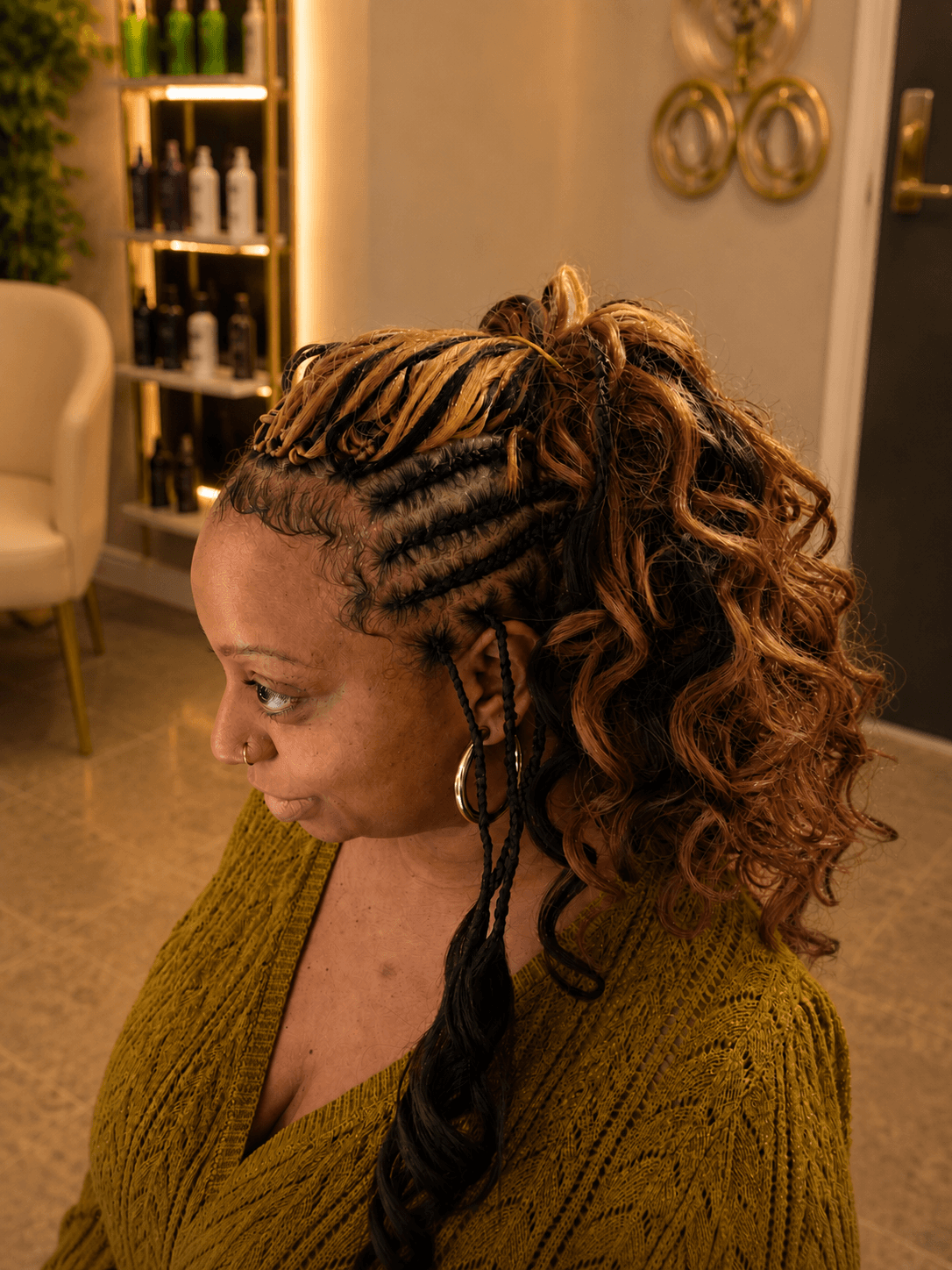 Honey caramel crochet braids in half-up style with curly ends — side view