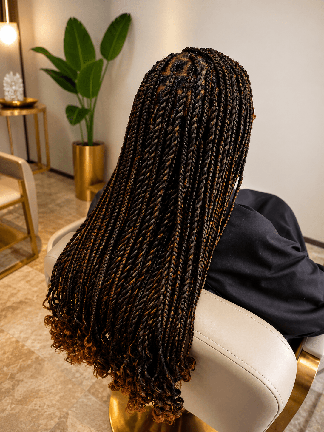 Long dark brown ombre Senegalese twists with curly ends — back view